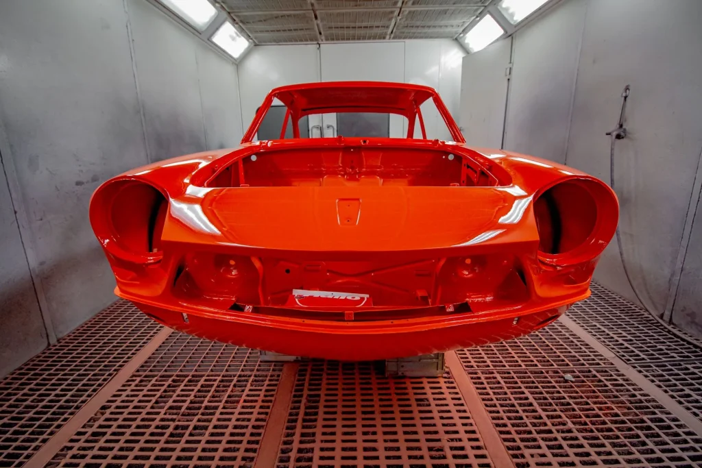 Car body inside a professional spray booth